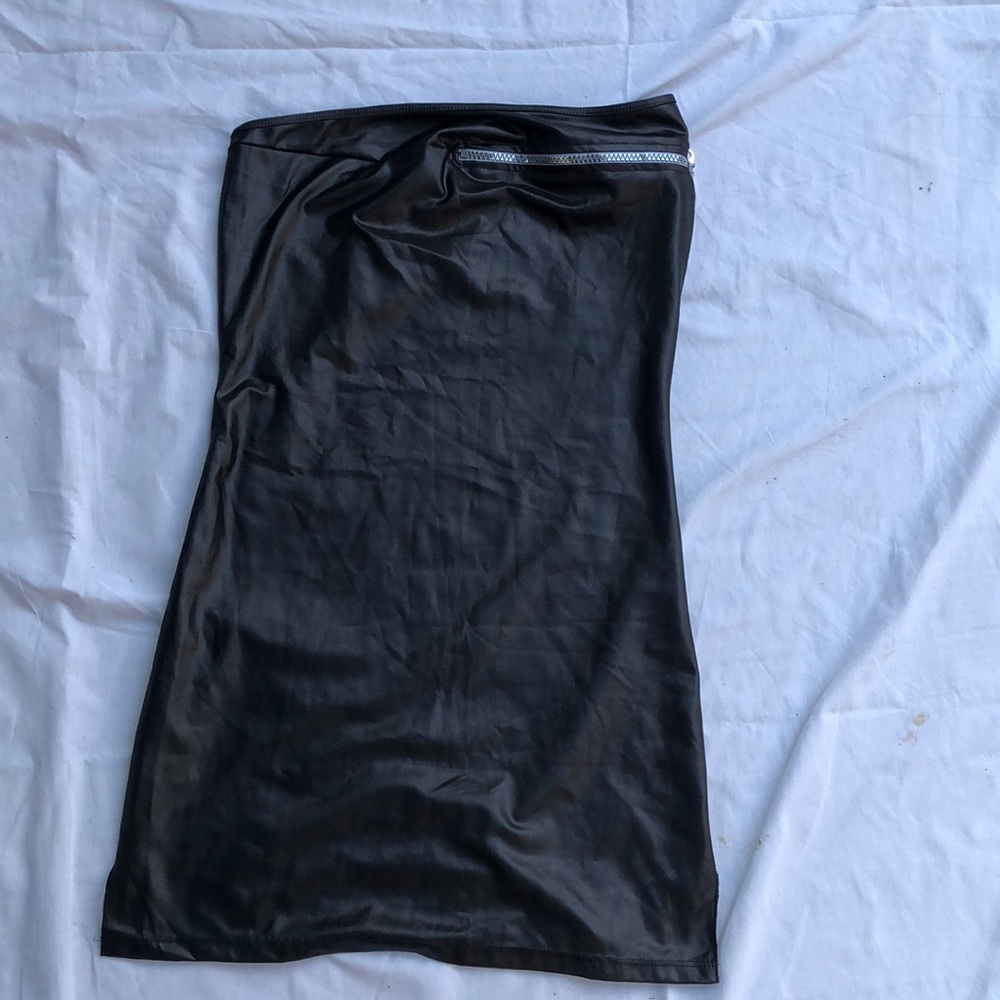 Youths/womens spandex mini dress with one sleeve.